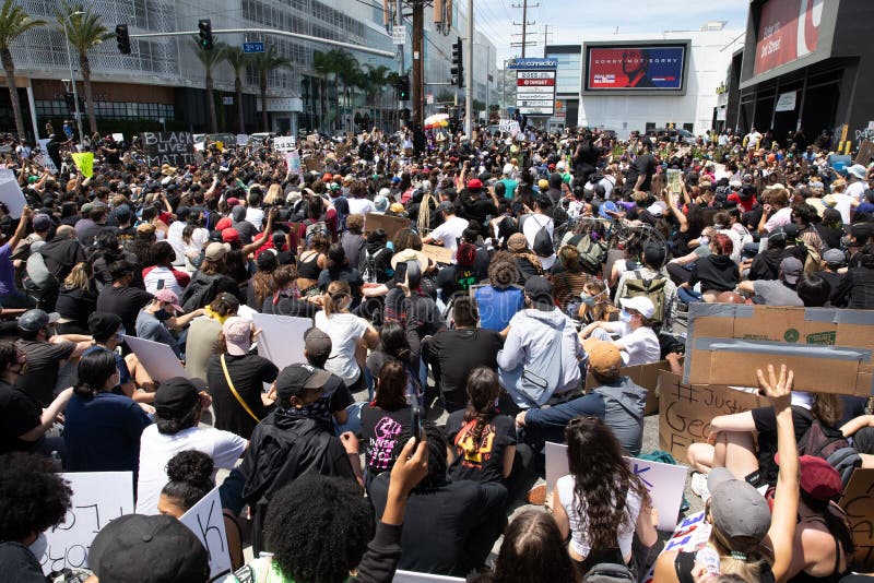 LOS ANGELES - MAY 30, 2020: Sign Saying No Justice No Peace On The Wall During The Protest March Against Police Violence Over Death Of George Floyd. LOS ANGELES - MAY 30, 2020: Sign Saying No Justice No Peace On The Wall During The Protest March Against Police Violence Over Death Of George Floyd.