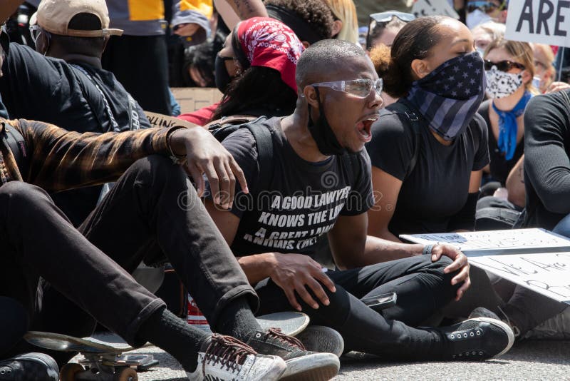 LOS ANGELES - MAY 30, 2020: Sign Saying No Justice No Peace On The Wall During The Protest March Against Police Violence Over Death Of George Floyd. LOS ANGELES - MAY 30, 2020: Sign Saying No Justice No Peace On The Wall During The Protest March Against Police Violence Over Death Of George Floyd.