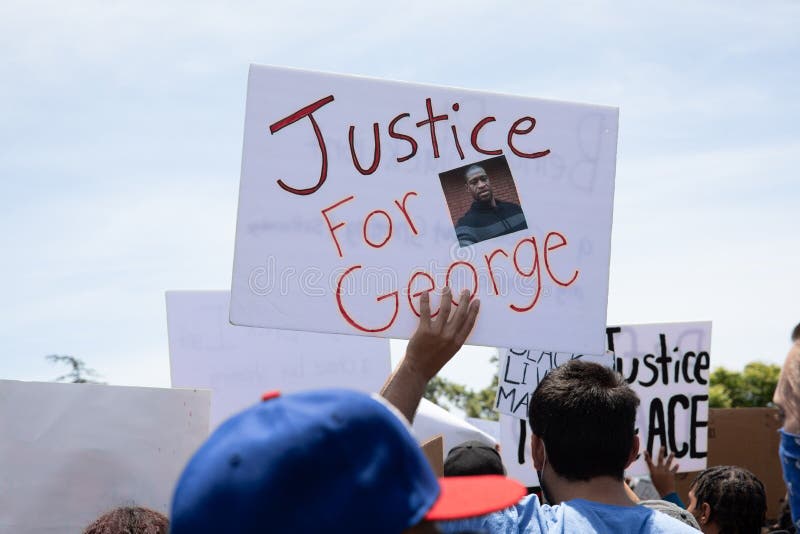 LOS ANGELES - MAY 30, 2020: Sign Saying No Justice No Peace On The Wall During The Protest March Against Police Violence Over Death Of George Floyd. LOS ANGELES - MAY 30, 2020: Sign Saying No Justice No Peace On The Wall During The Protest March Against Police Violence Over Death Of George Floyd.