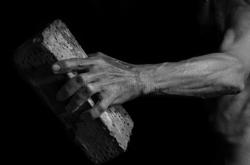 Protesting Man Throws a Brick. Stock Photo Image of conflict
