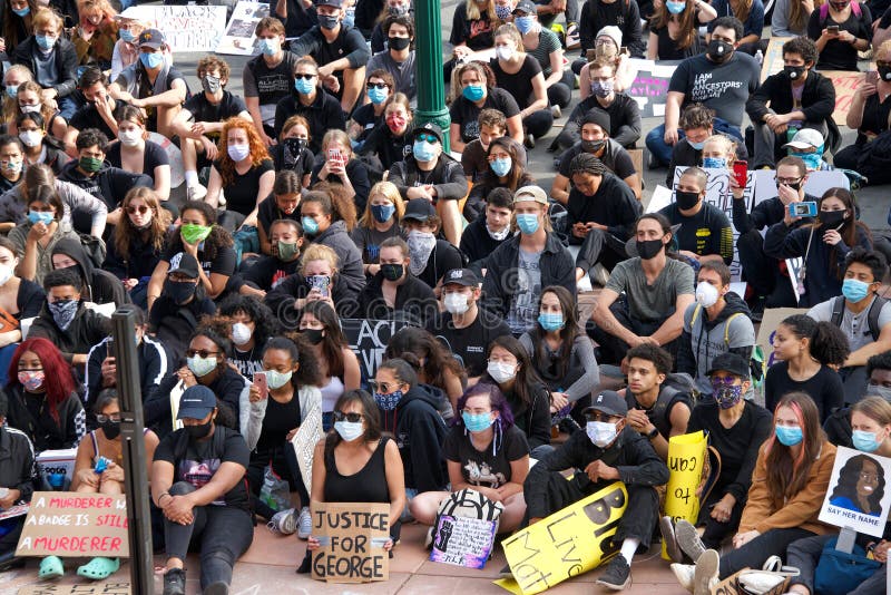 Alameda, CA - June 5, 2020: Protestors participating in  the George Floyd Black Lives Matter protest in Alameda, Rally at City Hall after marching from Encinal High School to City Hall. Alameda, CA - June 5, 2020: Protestors participating in  the George Floyd Black Lives Matter protest in Alameda, Rally at City Hall after marching from Encinal High School to City Hall