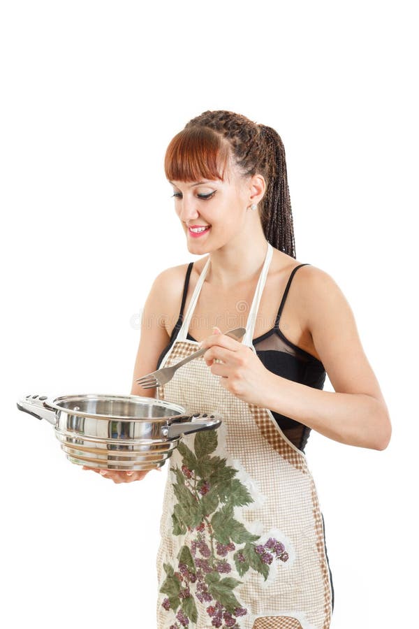 Proud cook with pot in the kitchen wearing apron stock photo Proud cook with pot in the kitchen wearing apron stock photo