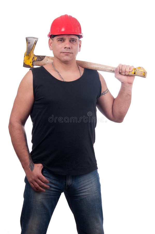 Proud lumberjack posing with ax on his shoulder