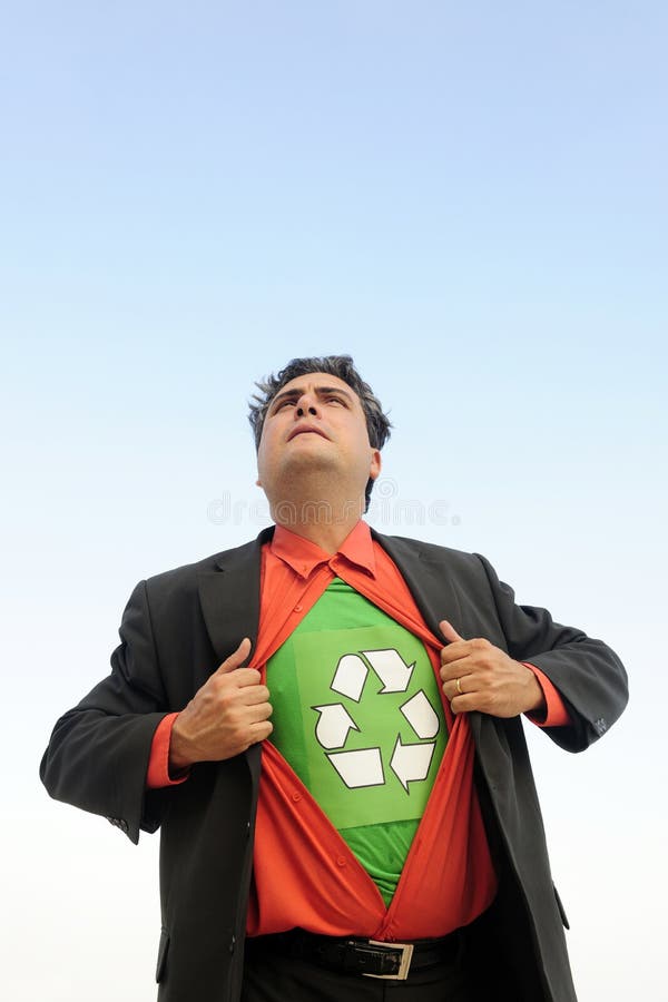 Proud to recycle: businessman is a recycling hero royalty free stock photo Proud to recycle: businessman is a recycling hero royalty free stock photo