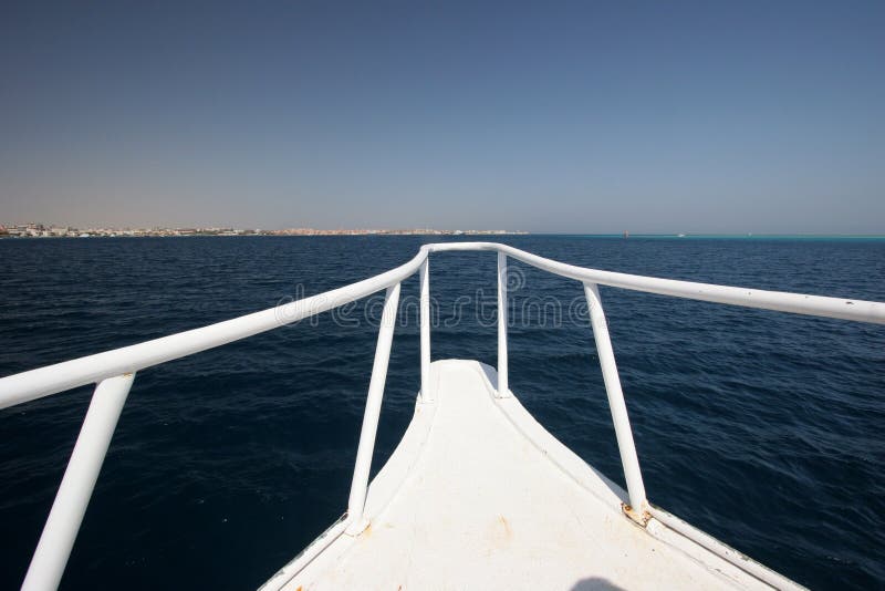 Ship bow moored to coral reef on the Red Sea, Hurghada, Egypt. Ship bow moored to coral reef on the Red Sea, Hurghada, Egypt.