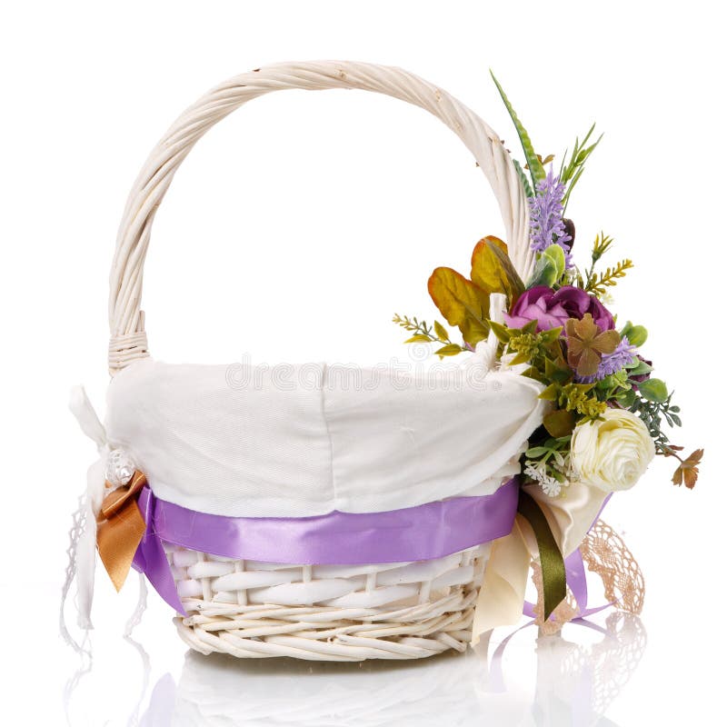 Provence Easter Floral Arrangement on a White Wicker Basket with a Vine