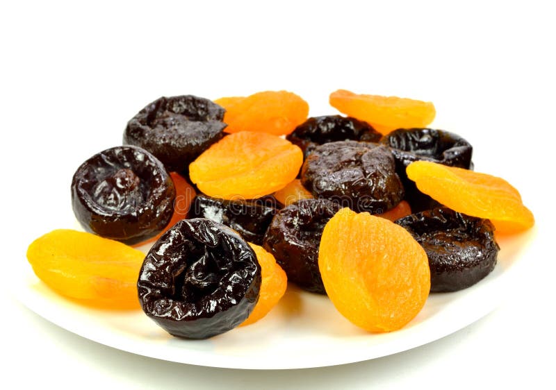 Prunes and apricots stock image. Image of apricots, plate 33602973