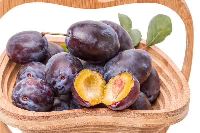 Prunes in a wooden vase