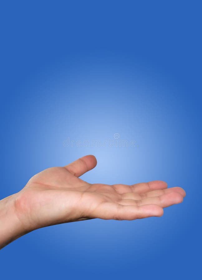 A hand is isolated in the air holding something. The background is blue. You can insert text or a photo in the hand. A hand is isolated in the air holding something. The background is blue. You can insert text or a photo in the hand.