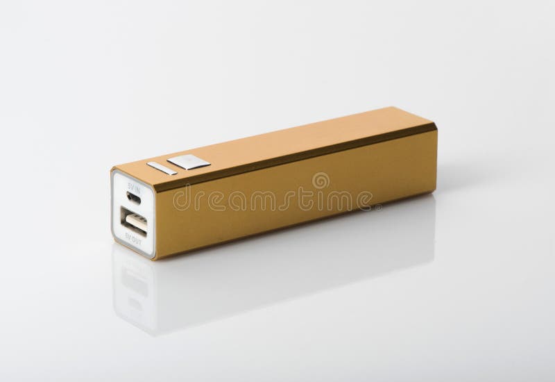 A portable charger for mobile phones on white with reflection. A portable charger for mobile phones on white with reflection