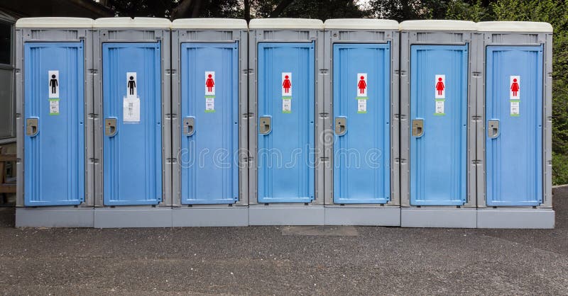 Portable toilets or mobile toilet cabins. Public Toilets at outdoor. Portable toilets or mobile toilet cabins. Public Toilets at outdoor