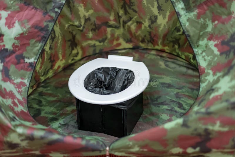 portable toilets in tent at camping public. portable toilets in tent at camping public.