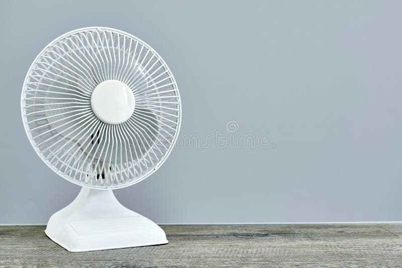 A studio photo of a portable electric fan. A studio photo of a portable electric fan