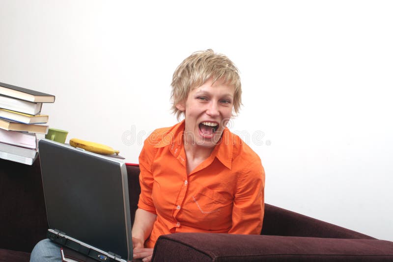 Attractive joyful woman over the laptop. Attractive joyful woman over the laptop