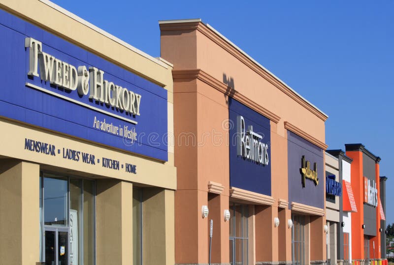 OTTAWA, CANADA - JULY 2: A row of store fronts in Barrhaven, which is part of Ottawa, Ontario. Barrhaven is the fastest growing neighbourhood in Ottawa, with thousands of new homes and many new stores being built in just the last few years. OTTAWA, CANADA - JULY 2: A row of store fronts in Barrhaven, which is part of Ottawa, Ontario. Barrhaven is the fastest growing neighbourhood in Ottawa, with thousands of new homes and many new stores being built in just the last few years.