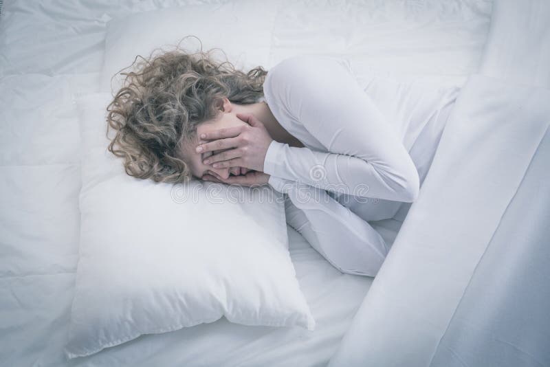 Picture of depressed woman sleeping all day. Picture of depressed woman sleeping all day