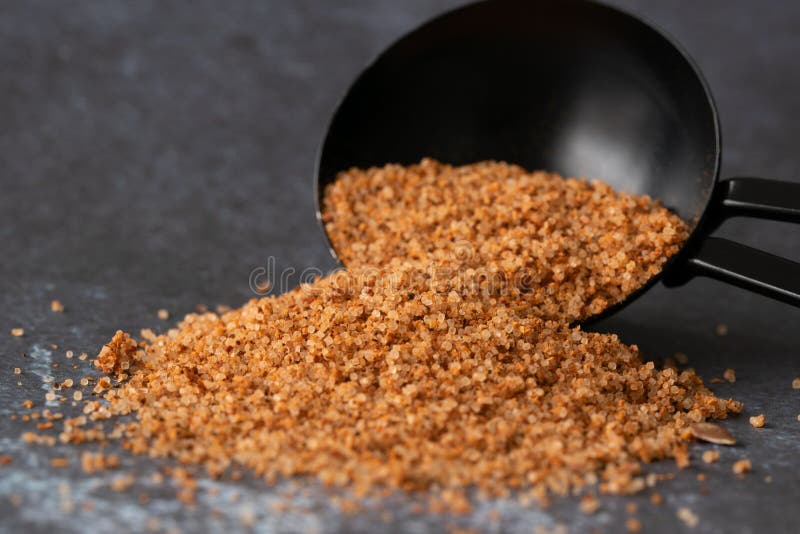 Close up view of creole seasoning spilled from a teaspoon. Close up view of creole seasoning spilled from a teaspoon