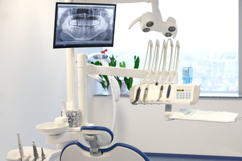 Modern dental practice. Dental chair and other accessories used by dentists. Modern dental practice. Dental chair and other accessories used by dentists.