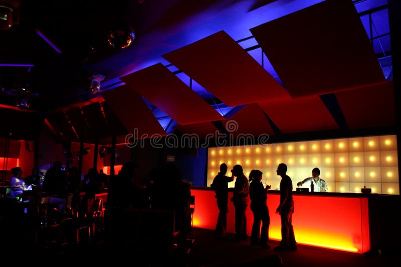 A bar with colorful lighting. A bar with colorful lighting