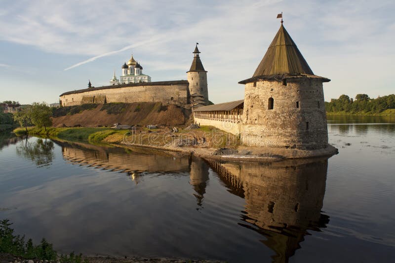 Pskov Kremlin and its huge Flat Tower early in the morning. Pskov Kremlin and its huge Flat Tower early in the morning