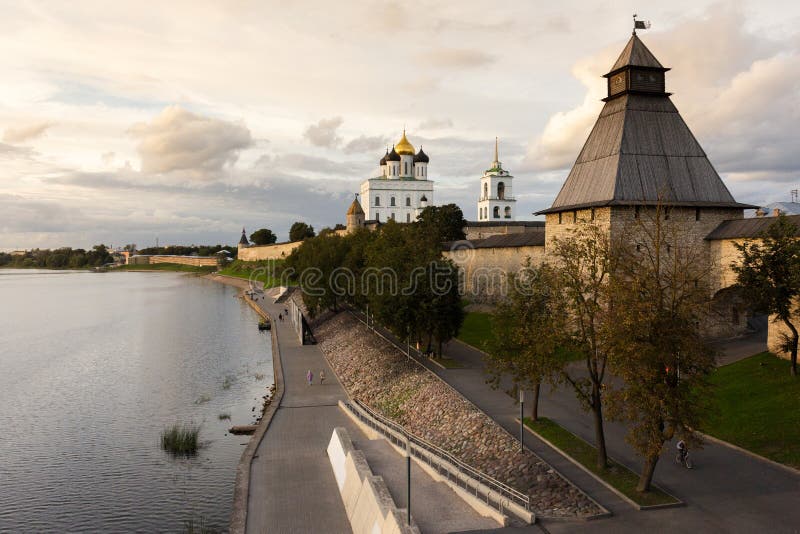 Pskov Krom or Pskov Kremlin over the river with mark `Russia begins here`. Pskov Krom or Pskov Kremlin over the river with mark `Russia begins here`