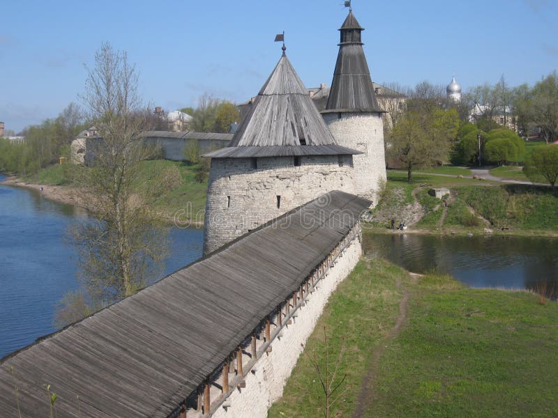 Middle ages fortress of old historical town Pskov, Russia, towers and wall, with view on the river, in summer.
