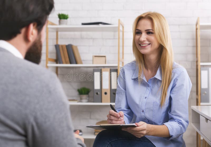 Psychologist having session with patient in office