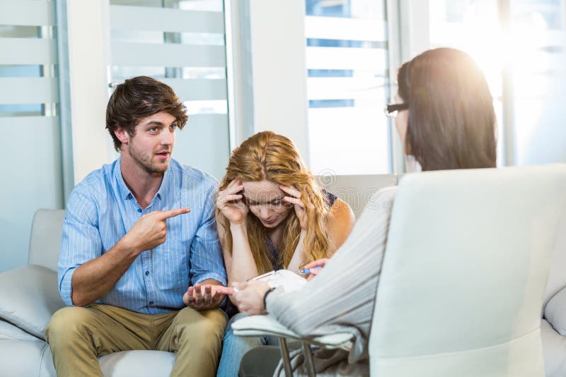 Psychologist Helping a Couple with Relationship Difficulties Stock