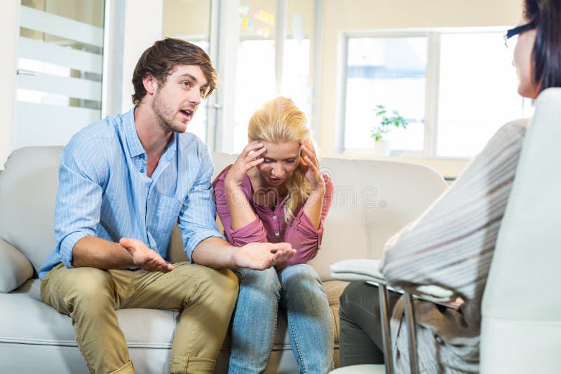 Psychologist Helping a Couple with Relationship Difficulties Stock