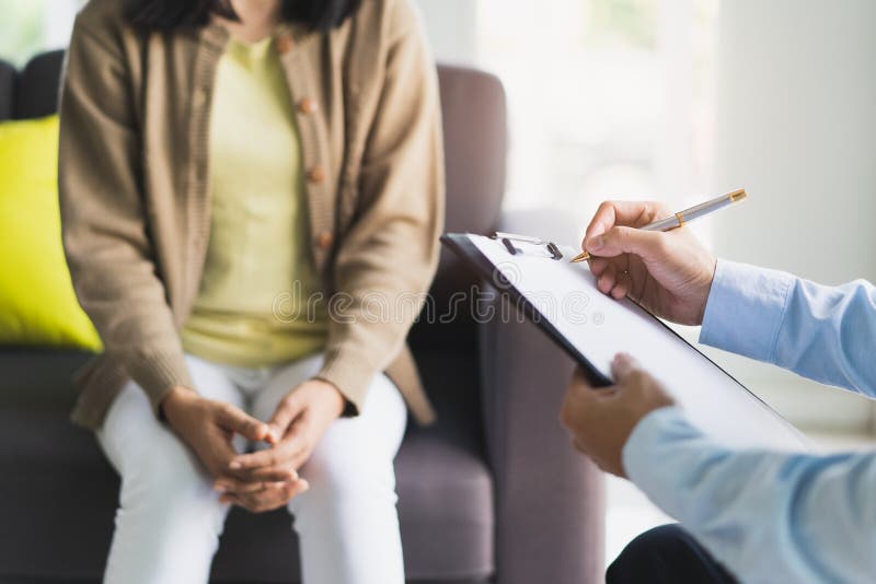 Psychologist Talking with Depressed Patient about Mental Condition