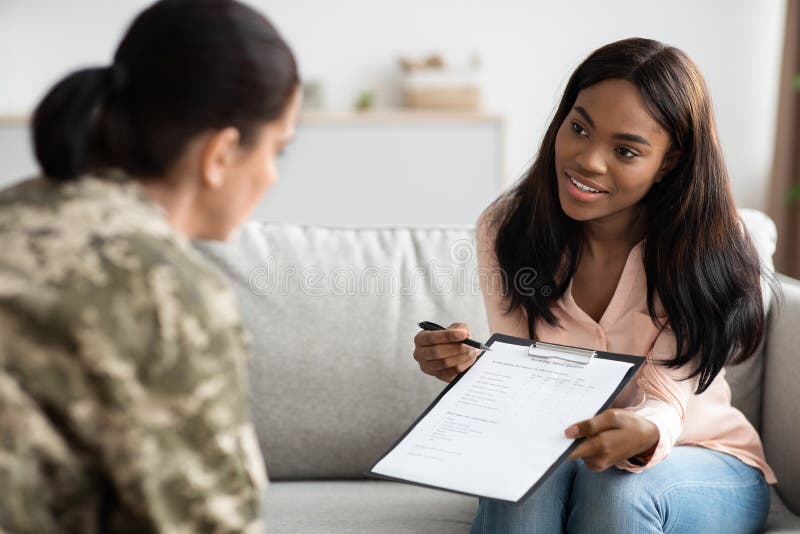 Psychology Survey. Black Psychiatrist Lady Holding Clipboard With Questionnaire, Testing Military Woman