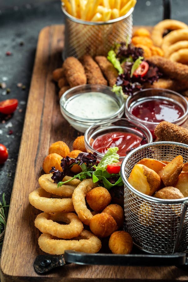 Pub Appetizers Fried Mozzarella Sticks, Onion Rings, French Fries