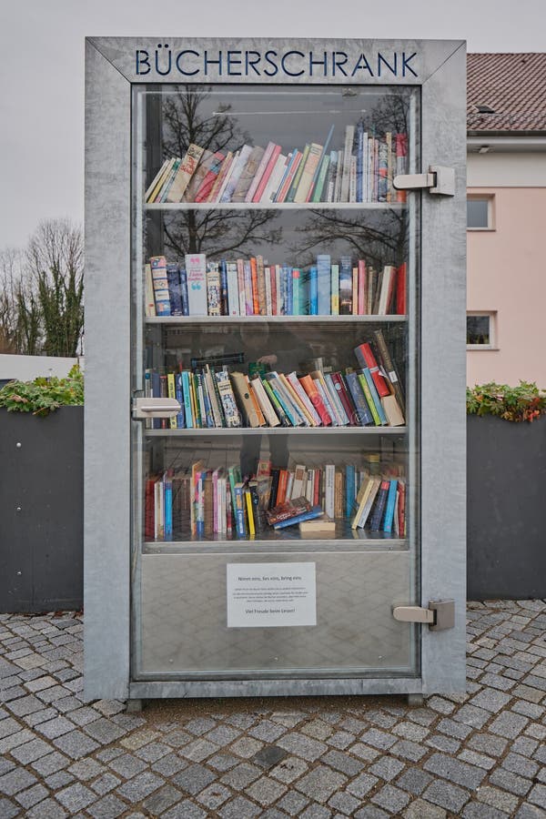 A public bookcase serves as a free open-air library in Hechingen stock images