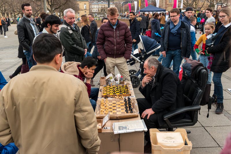 Public chess game by amateurs on the central historical street of Koenigstrasse King Street. stock images Public chess game by amateurs on the central historical street of Koenigstrasse King Street. stock images