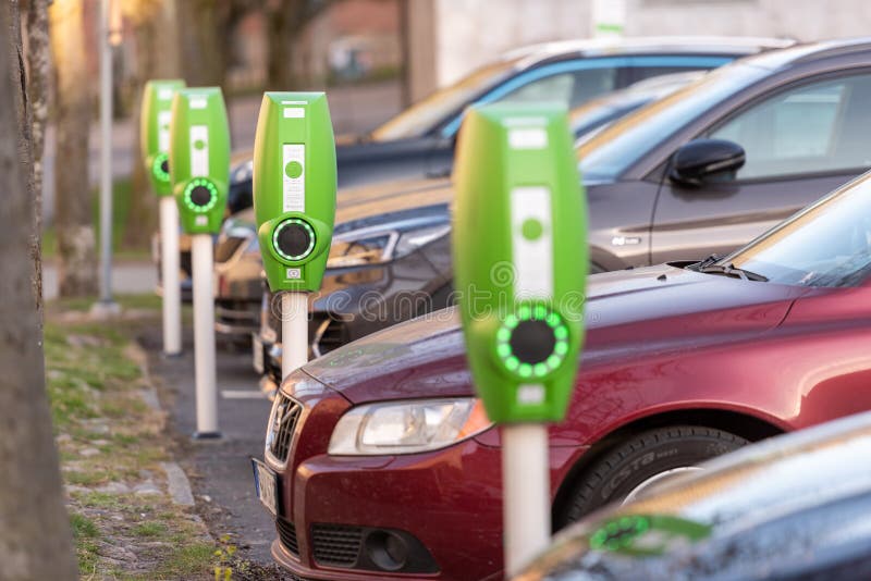 Public EV Electrical Vehicle Charging Poles at a Car Park.. Editorial