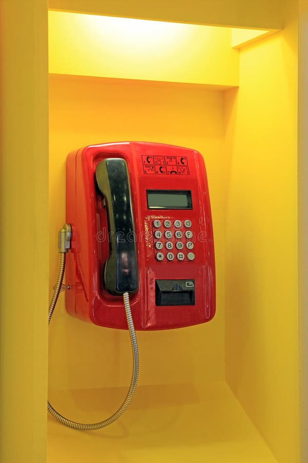 Yellow glass telephone booths with payphones are located on a pedestrian  street. Obsolete means of telephone communication in free access. Bialystok  Stock Photo - Alamy