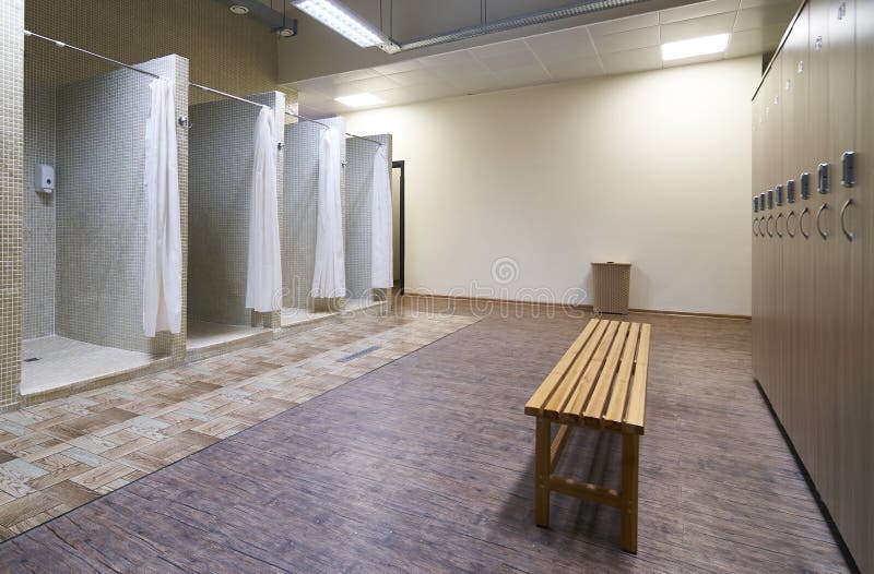 Public shower interior with everal showers