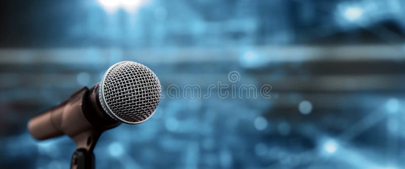 Public speaking backgrounds, Close-up the microphone on stand for speaker speech at seminar room royalty free stock photography