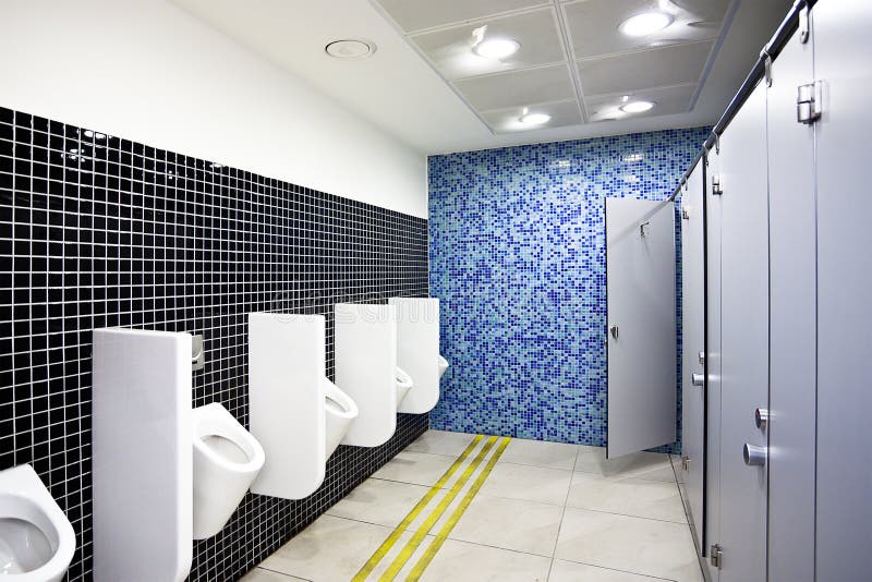 Public Toilet With Cubicles And Urinals Stock Photo - Image of latrine ...