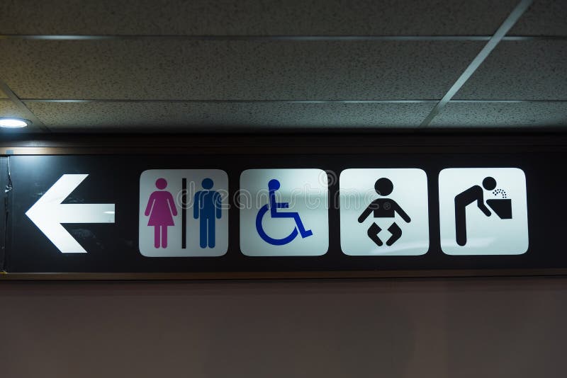 A public toilet with disabled access sign in the airport terminal.Thailand stock photography A public toilet with disabled access sign in the airport terminal.Thailand stock photography