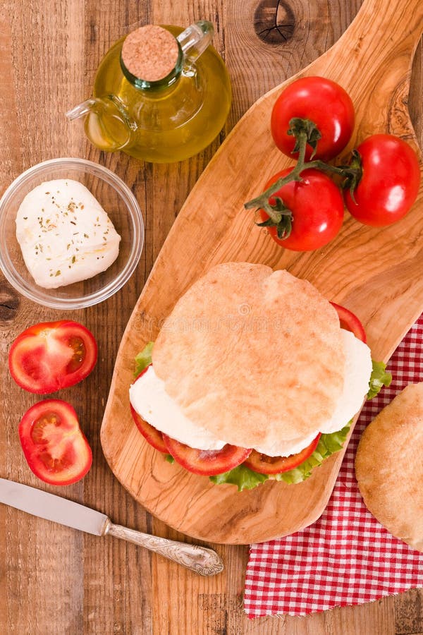 Puccia Bread with Mozzarella and Tomato. Stock Photo Image of