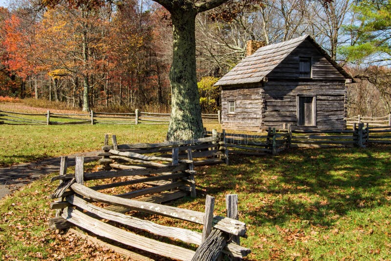 Carroll County, Virginia USA - November 2nd: The Puckett cabin on Groundhog Mountain is a historic site on the Blue Ridge Parkway that stands as a tribute to the legendary midwife Orlean Hawks Puckett, The cabin is located on the Blue Ridge Parkway in the mountains of southwestern Virginia, USA on November 2nd, 2014, Carroll County, Virginia, USA. Carroll County, Virginia USA - November 2nd: The Puckett cabin on Groundhog Mountain is a historic site on the Blue Ridge Parkway that stands as a tribute to the legendary midwife Orlean Hawks Puckett, The cabin is located on the Blue Ridge Parkway in the mountains of southwestern Virginia, USA on November 2nd, 2014, Carroll County, Virginia, USA.