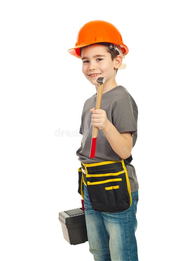 Boy with helmet holding hammer and tools box isolated on white background. Boy with helmet holding hammer and tools box isolated on white background