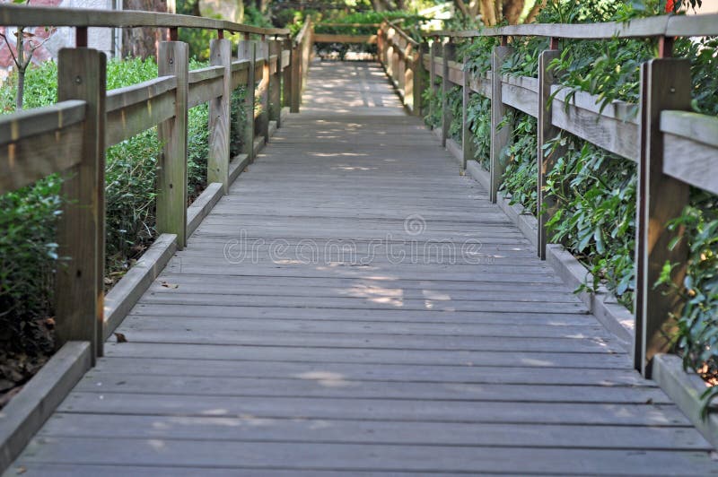 Puente de madera del parque, puente de madera, barandilla, vida, puente de madera, Fujian Quanzhou, puente, tráfico, muestras, ce fotos de archivo libres de regalías Puente de madera del parque, puente de madera, barandilla, vida, puente de madera, Fujian Quanzhou, puente, tráfico, muestras, ce fotos de archivo libres de regalías