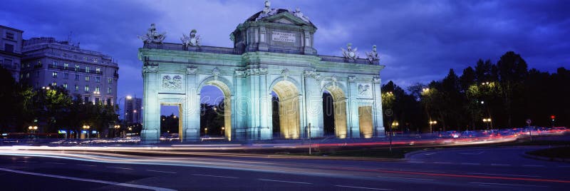 Night panoramic photo of Puerta del Alcala, Madrid, Spain