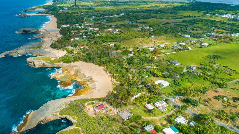 Aerial view of Puerto Rico. Faro Los Morrillos de Cabo Rojo. Playa Sucia beach and Salt lakes in Punta Jaguey.