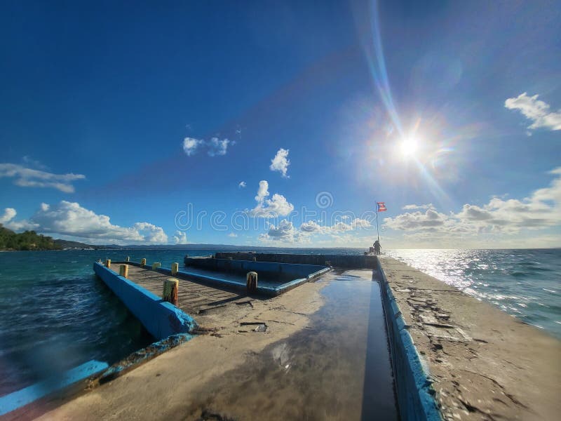 Puerto Rico pier stock image. Image of cloud, glass 239153529