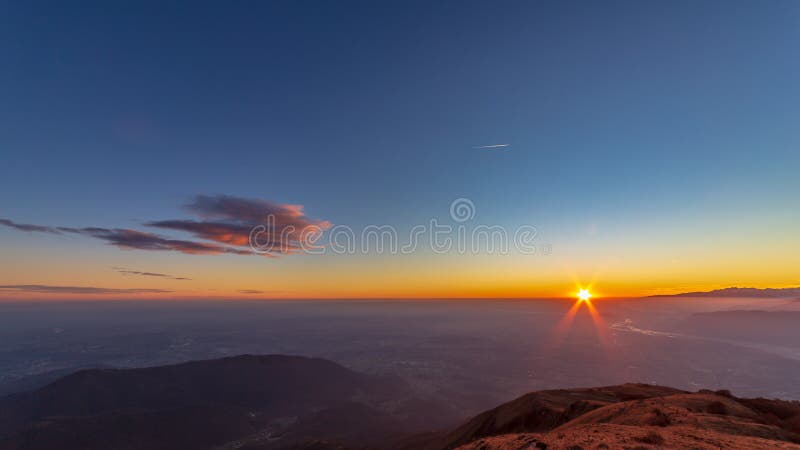 Sunset at the Cuarnan peak, Friuli-Venezia Giulia Region, in a freezing winter day. Sunset at the Cuarnan peak, Friuli-Venezia Giulia Region, in a freezing winter day