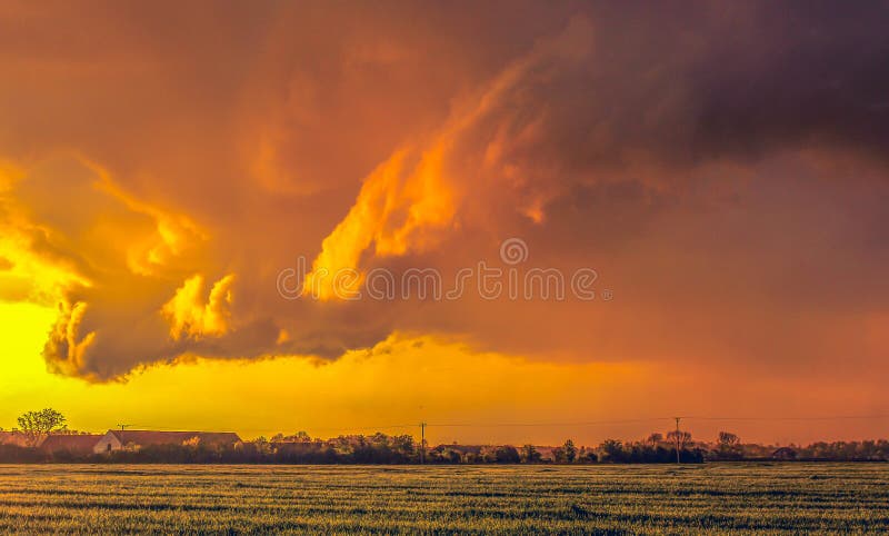 Amazing landscape photo taken with Canon 70D. Magical Orange Sunset over the field. Amazing landscape photo taken with Canon 70D. Magical Orange Sunset over the field