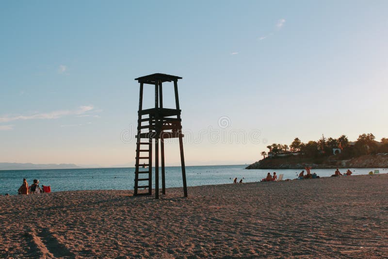Puesta del sol de la playa de Glyfada en Grecia imagenes de archivo Puesta del sol de la playa de Glyfada en Grecia imagenes de archivo